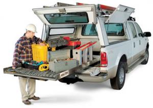 A Lincoln California sprinkler repair repair tech unloads his truck 
